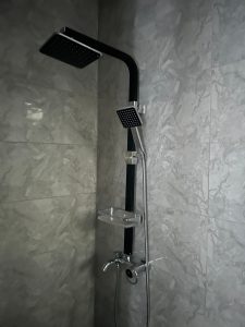 Modern bathroom shower in this affordable 2 bedroom apartment in Amazing Grace Court 3 estate Lagos