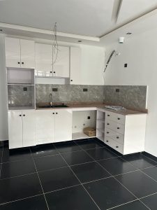 Spacious kitchen with kitchen fittings and cabinet at Amazing Grace Court 3 Affordable houses/homes/apartments for sale in Lagos 
