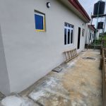 Backyard view of Almond County Homes