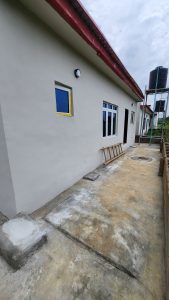 Backyard view of Almond County Homes